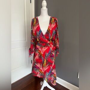 Red Carter size medium long sleeve slit arm dress.